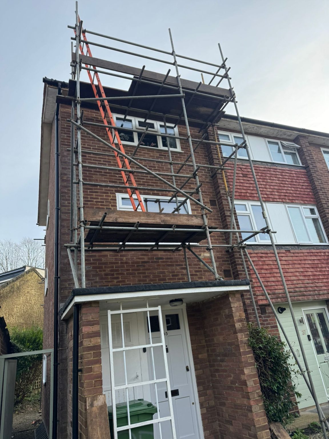 Scaffolding erected for a full flat and pitched roof replacement