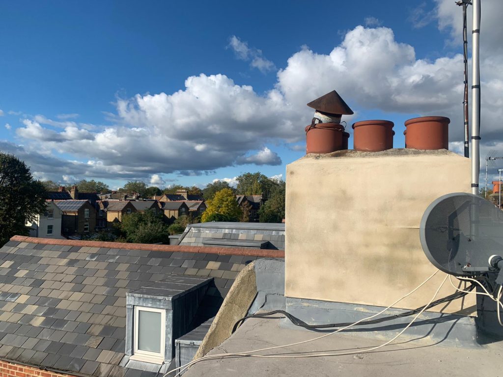 Completed chimney render and flat roof work on a London property